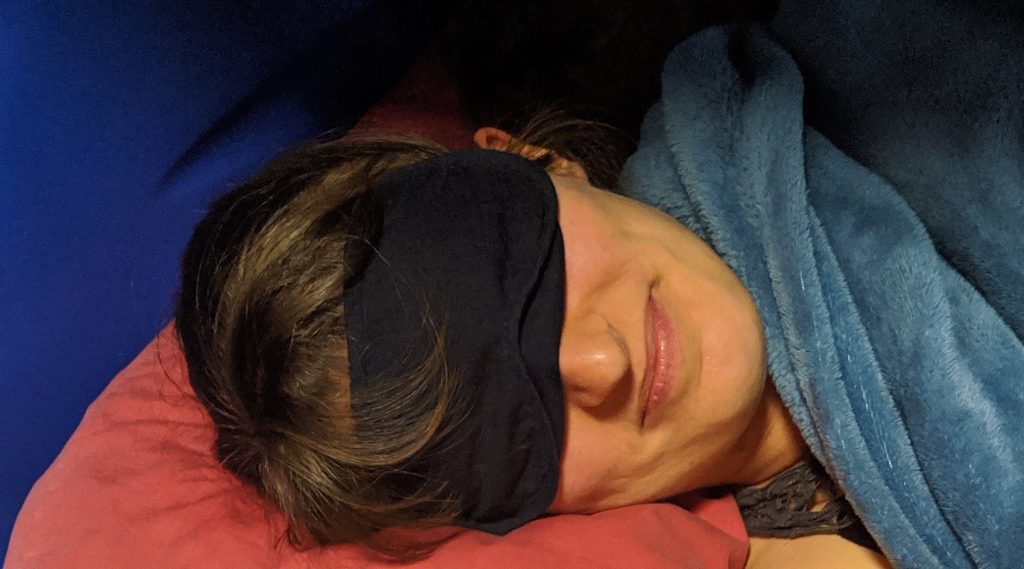 Bring a sleep mask with you to help you sleep in a room that may have light from other travellers